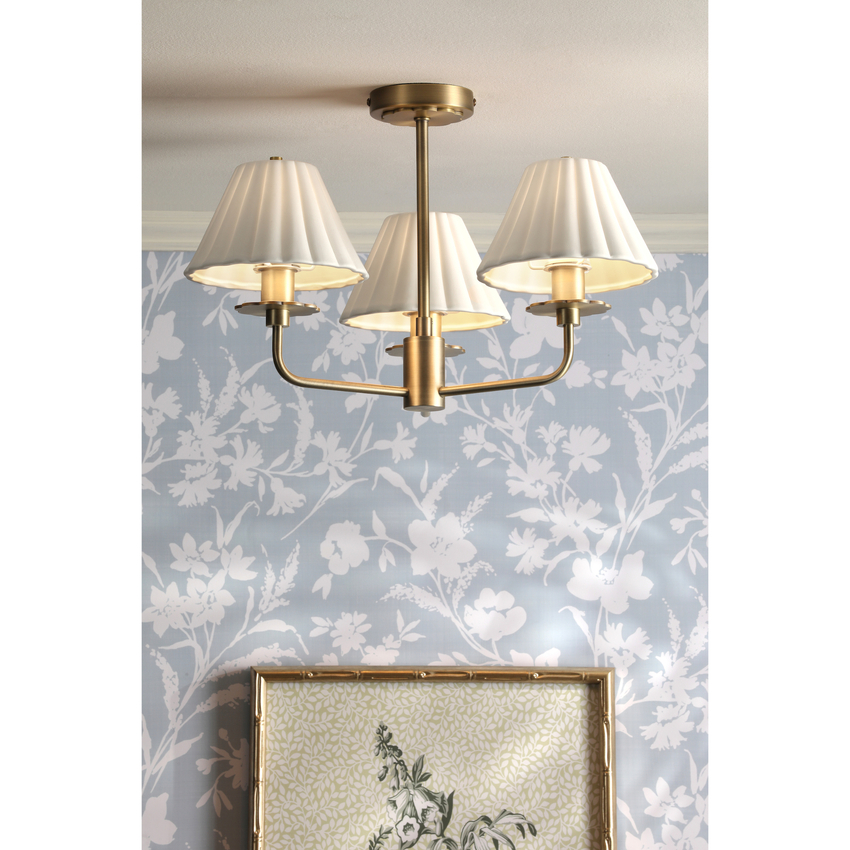 Photograph: Laura Ashley Mixbury 3 Light Semi-Flush Matt Antique Brass and White Ceramic