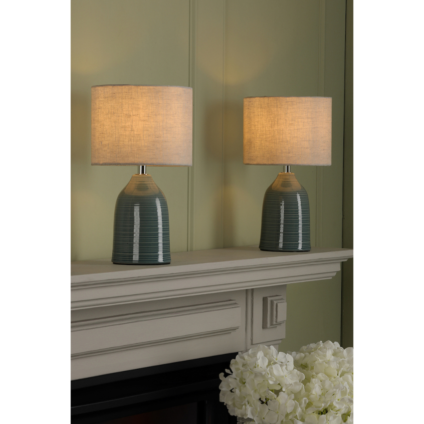 Photograph: Laura Ashley Penny Twin Pack of Blue Ceramic Table Lamps Complete With Natural Oatmeal Shades - Switched