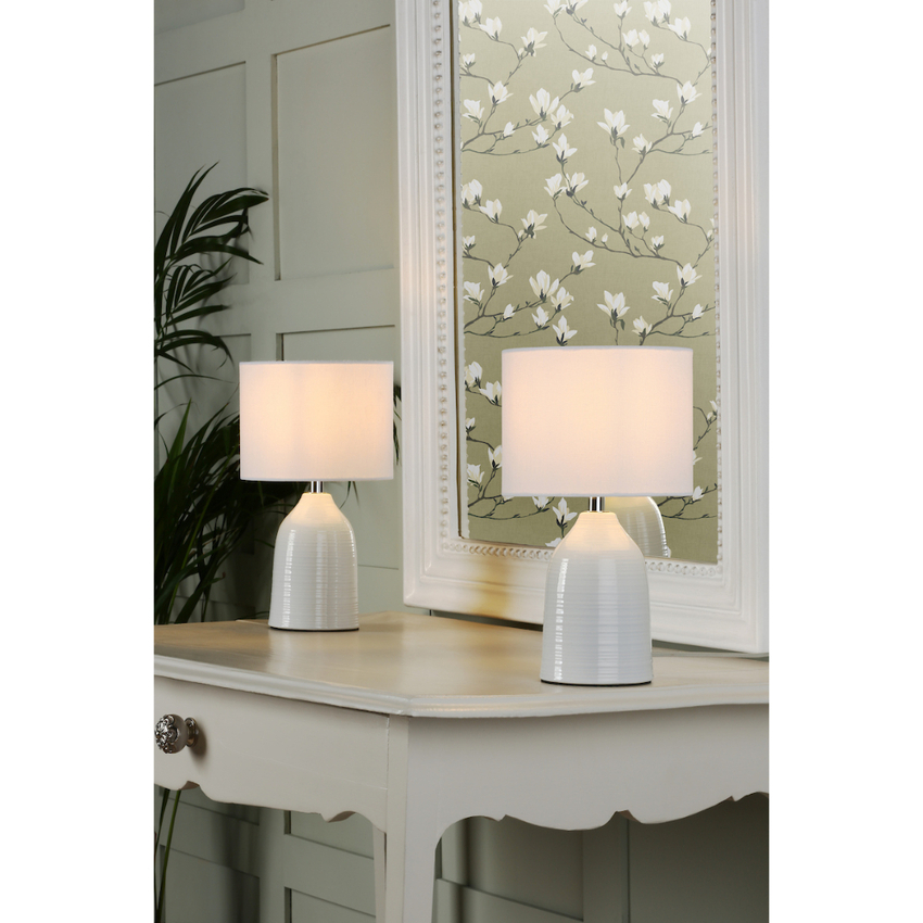 Photograph: Laura Ashley Penny Twin Pack of Cream Ceramic Table Lamps Complete With Natural Ivory Shades - Switched
