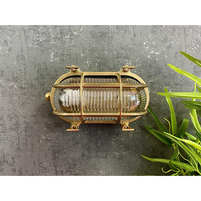 Photograph: Navigator Horatio Junior Raw Brass Oval Bulkhead - IP64, Solid Brass, Coastal