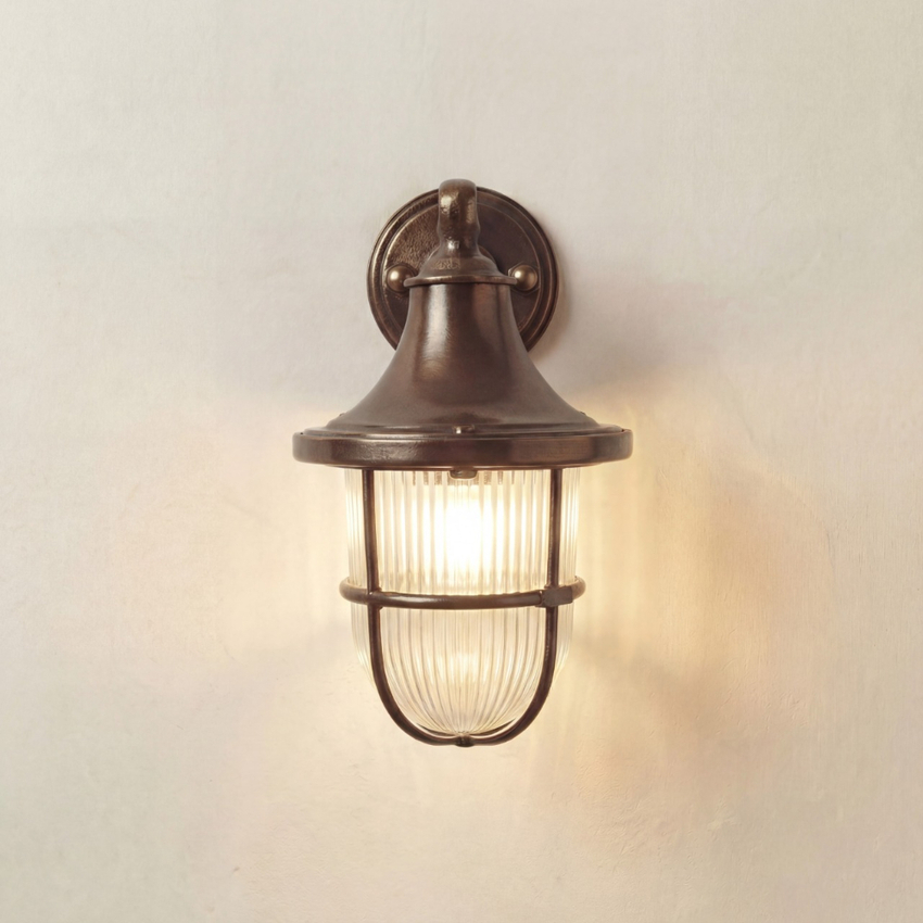 Photograph: Navigator Tiller Antique Brass Downard Facing Wall Light With Clear Ribbed Glass - IP64, Solid Brass, Coastal