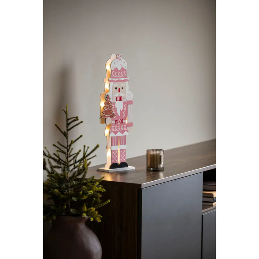 Photograph: Pink nutcracker, wood, Warm White Led, 6H/timer 2xAA & USB