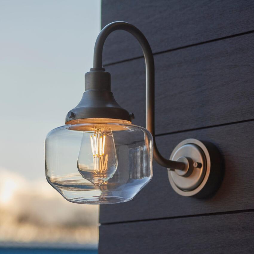 Photograph: Thorlight Kukes Brushed Silver Exterior Swan Neck Wall Light With Clear Glass Shade