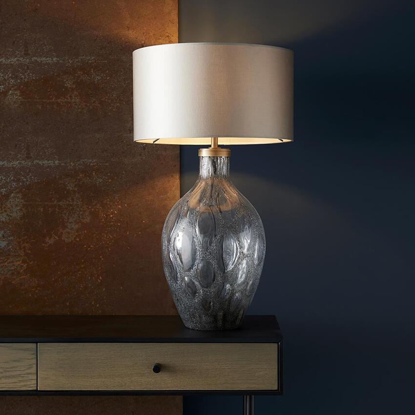 Photograph: Thorlight Nila Charcoal Tinted Artisan Glass Table Lamp Complete With Antique Brass Detailing