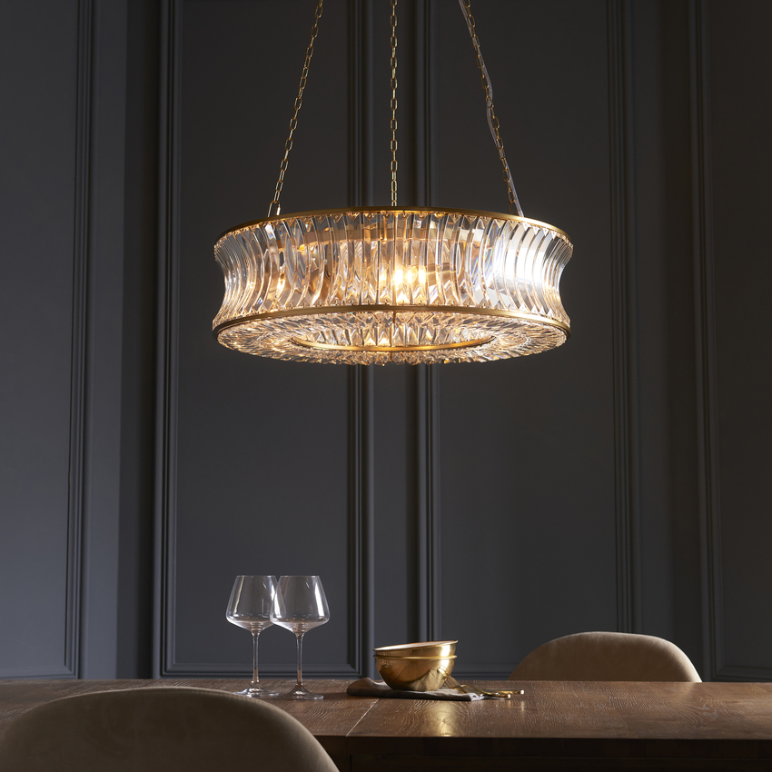 Photograph: Thorlight Paityn 6 Light Curved Crystal Chandelier Brass