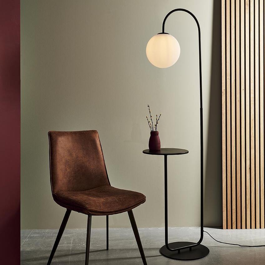 Photograph: Thorlight Phoenix Satin Black Painted Floor Lamp With Opal Glass Globe and Table